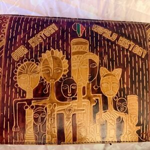 Hand-Tooled Leather Clutch with 'Our History / World History' Artwork